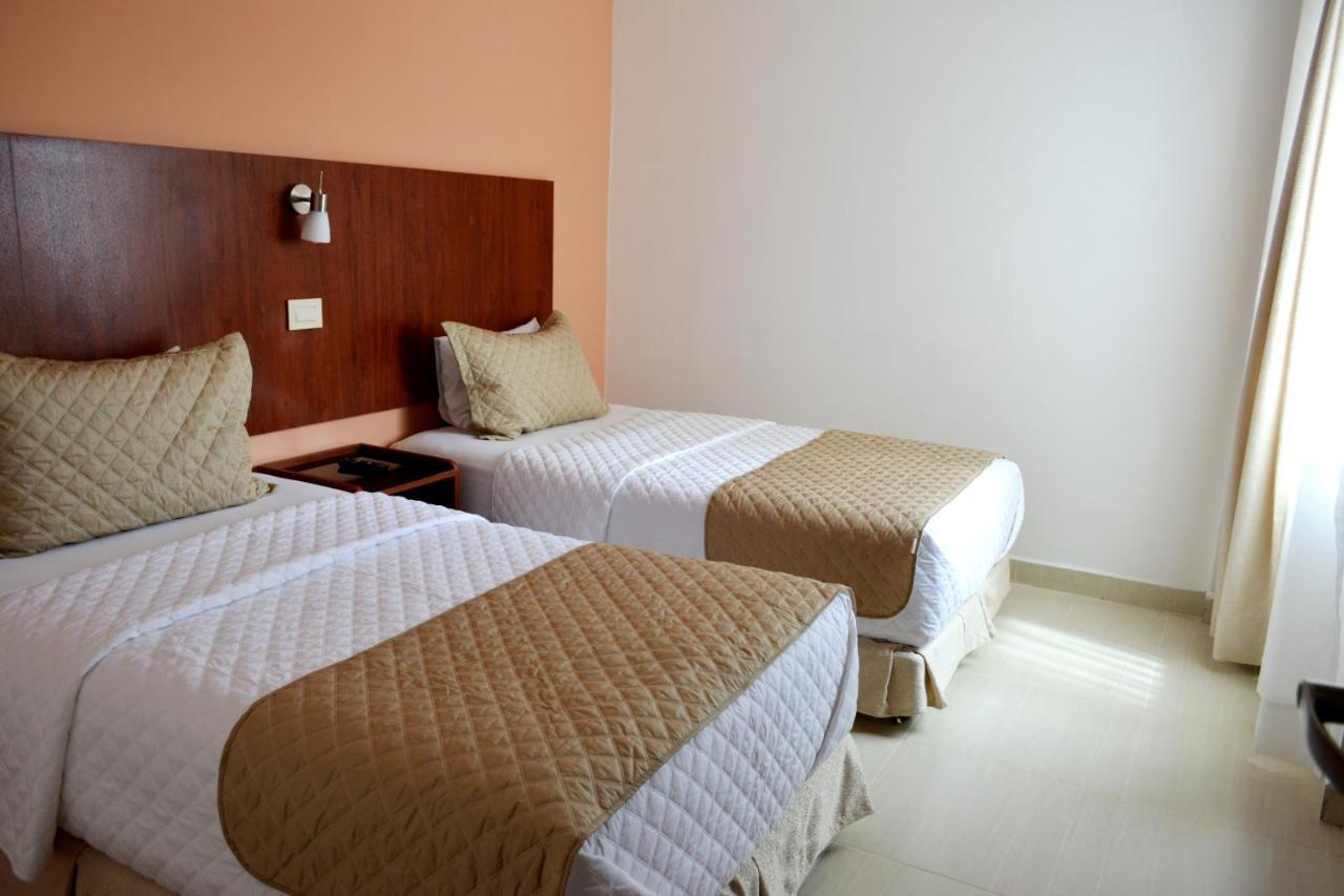 Premium Suites Business Aparthotel Equipetrol サンタ・クルス・デ・ラ・シエラ 部屋 写真